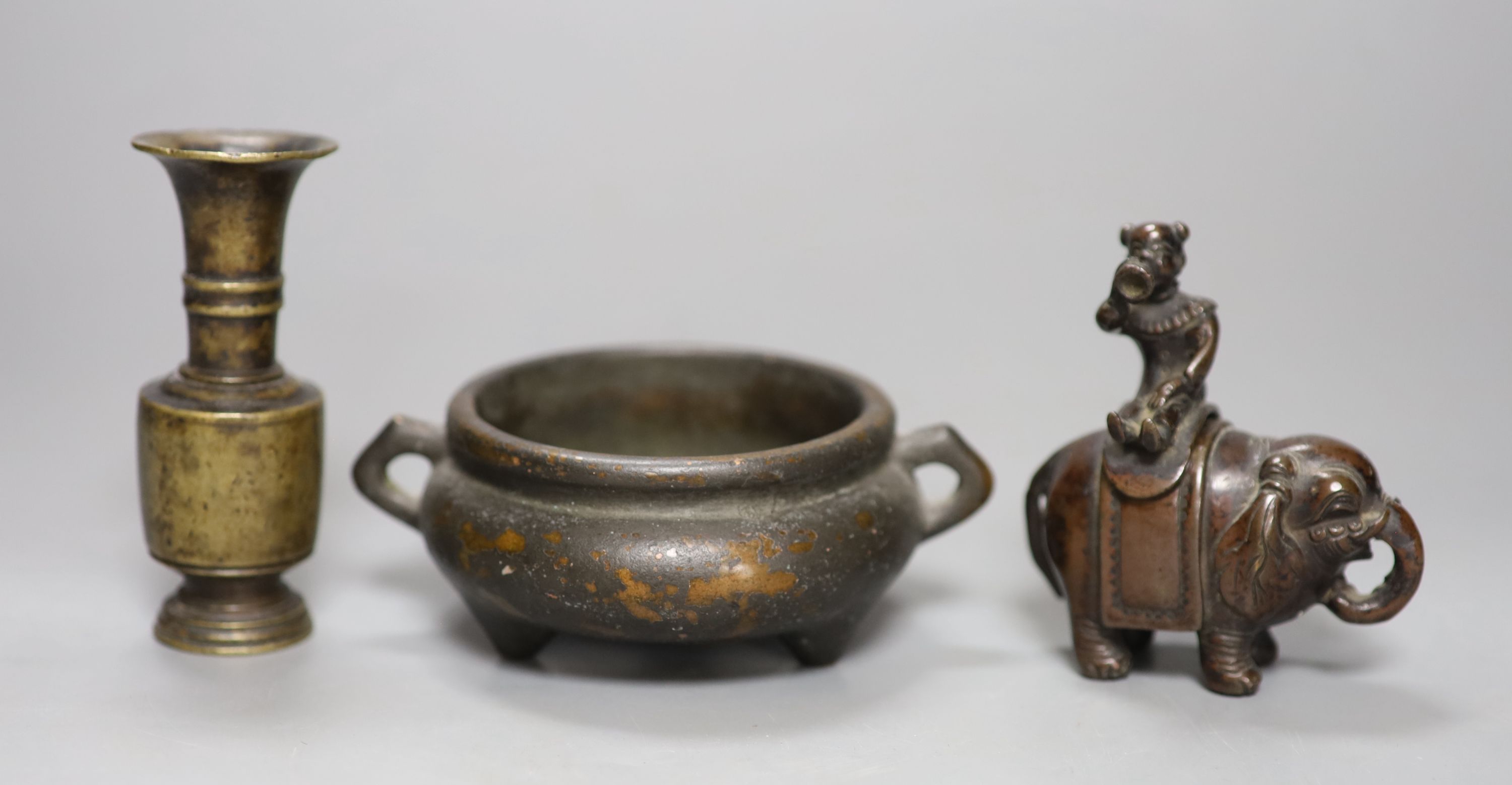 A Chinese late Ming bronze miniature vase, a modern censer and a Japanese elephant censer with boy cover, c.1900, tallest 10cm